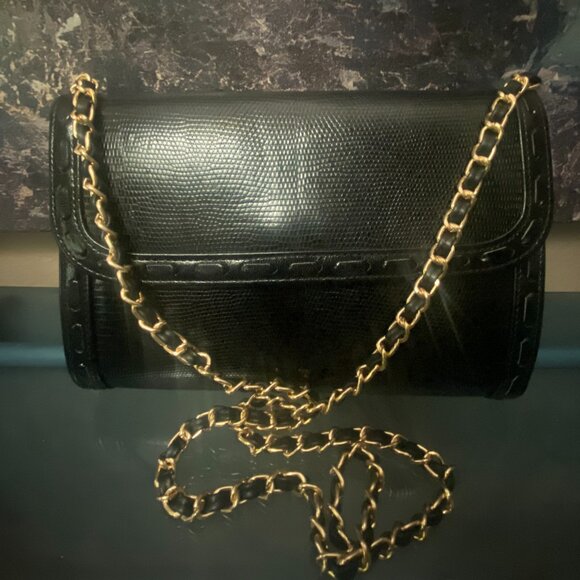 Yves Saint Laurent Black Embossed Leather Pochette – Chic & Timeless